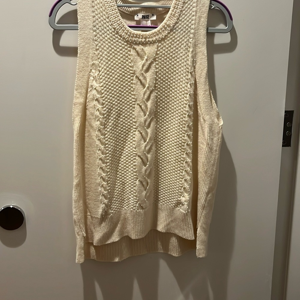 Paige off white sleeveless top with beading detail. Primarily nylon. Hand wash